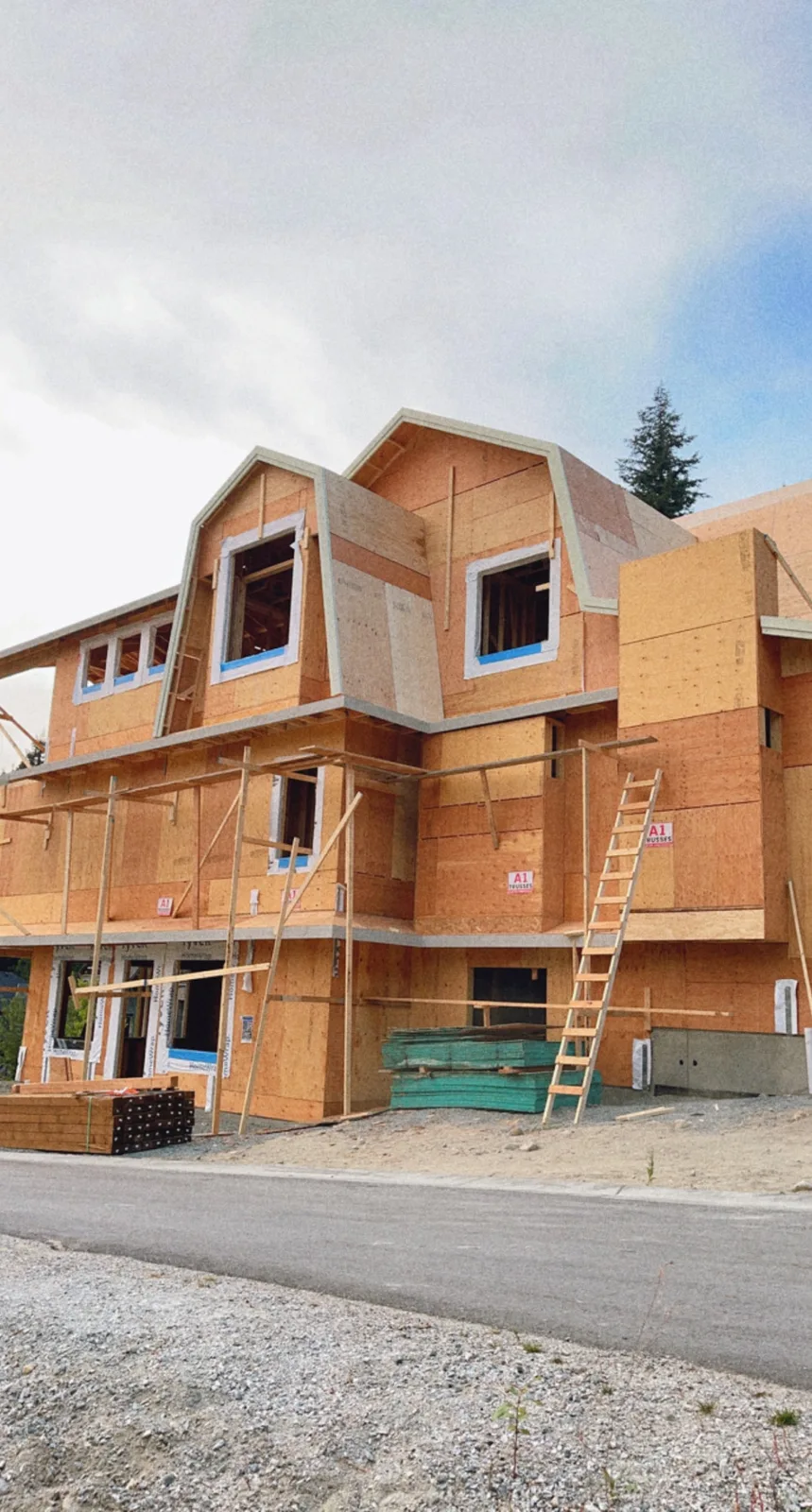 Detailed structural wall and roof framing on a multi-storey residence