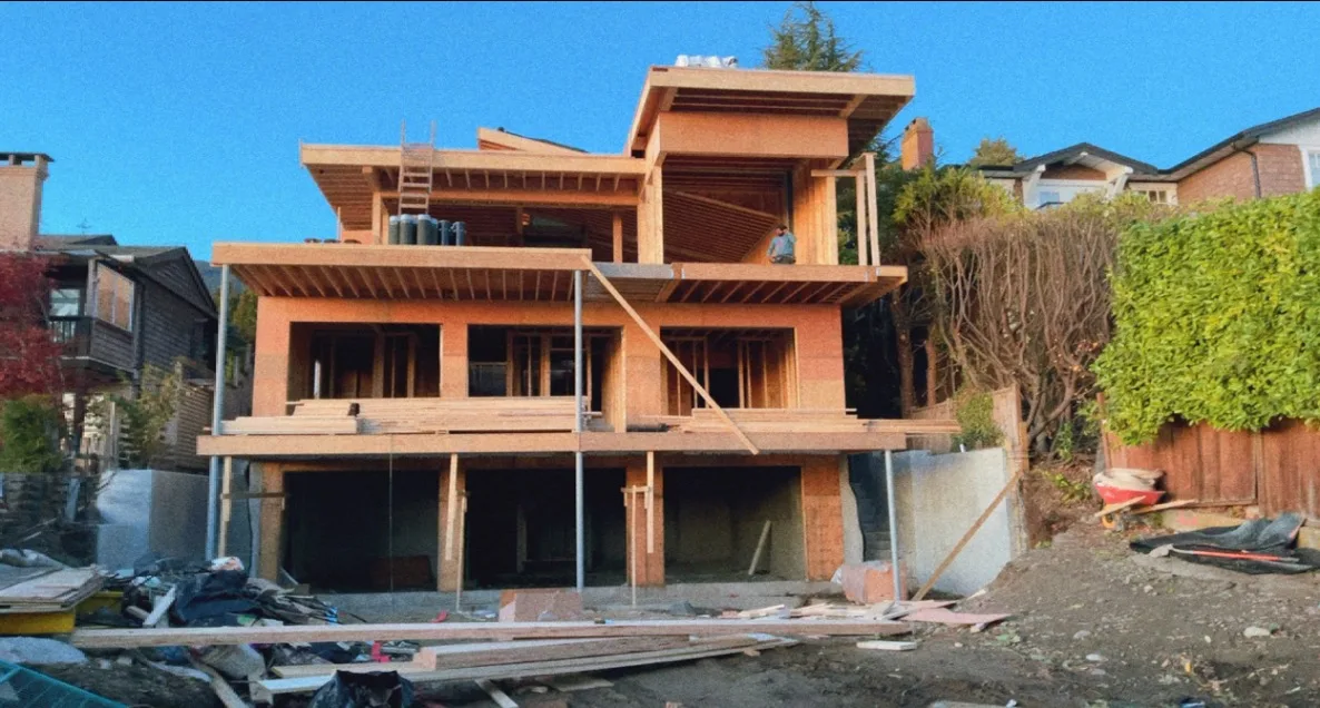 Wood-framed multi-storey home under construction
